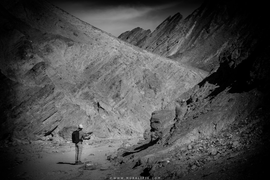 A guy hiking the Golden Canyon Trail at Death Valley National Park in California